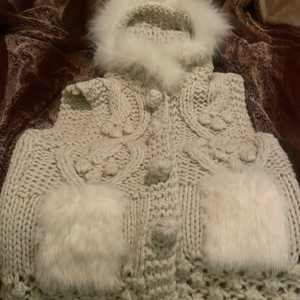 Cable knit and fur vest